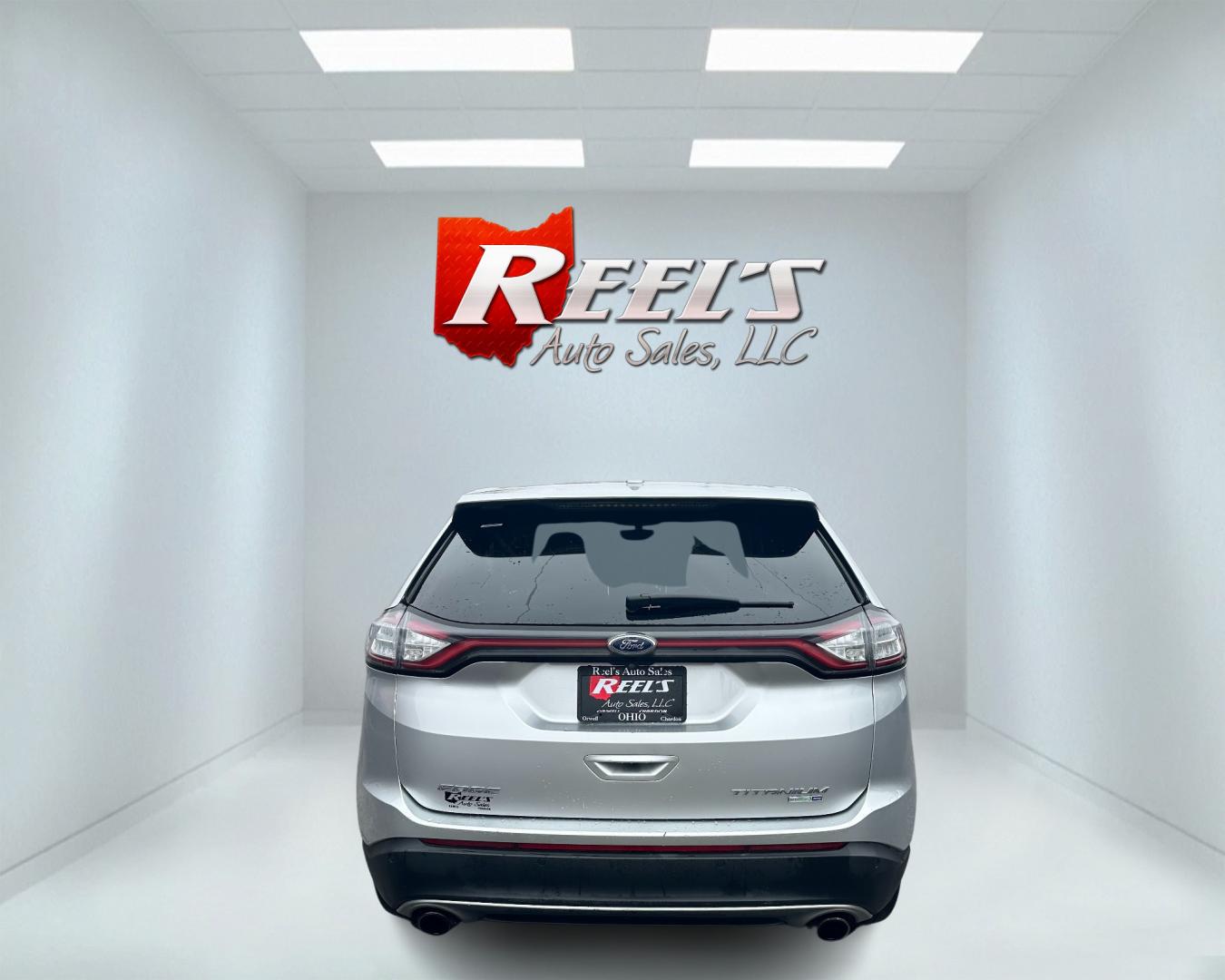 2017 Silver /Black Ford Edge Titanium (2FMPK4K92HB) with an 2.0L I4 DOHC 16V Turbo engine, 6-Speed Automatic transmission, located at 547 E. Main St., Orwell, OH, 44076, (440) 437-5893, 41.535435, -80.847855 - This 2017 Ford Edge Titanium AWD is a well-equipped midsize SUV. It comes with a powerful yet efficient 2.0L EcoBoost engine paired with a smooth 6-speed automatic transmission. Notable features include LED daytime running lights, dusk-sensing headlights, leather interior, auto-dimming rearview mirr - Photo#5